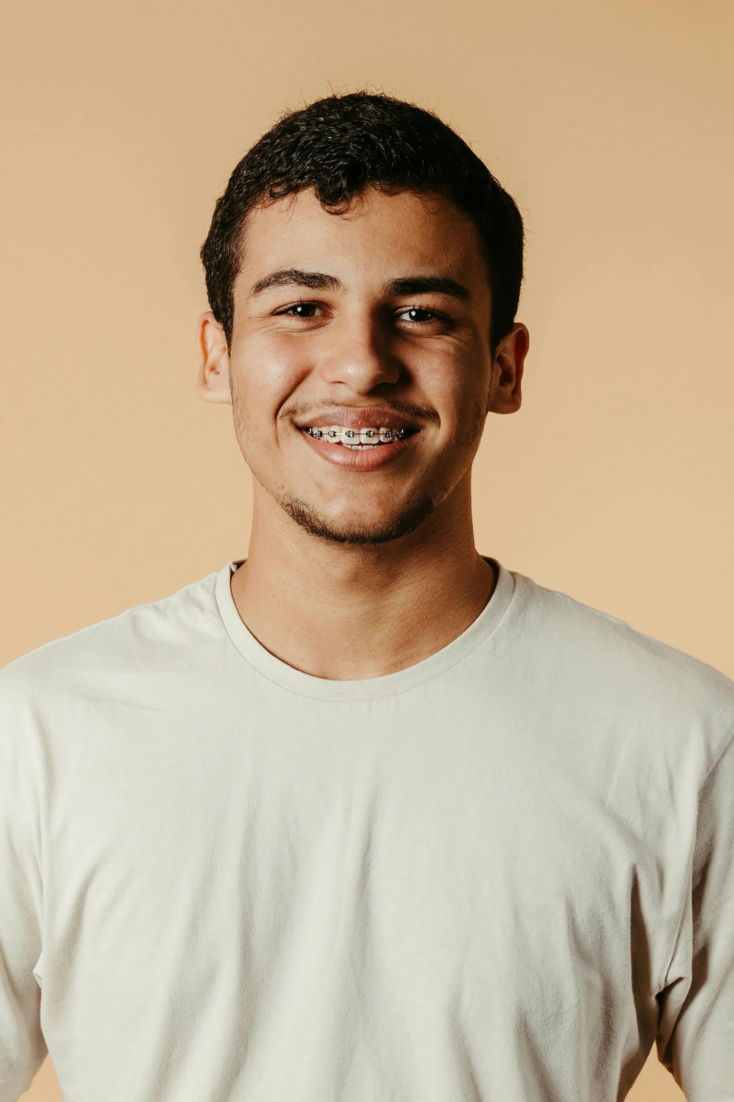 Young patient smiling with braces